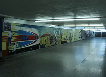 design poděbradského podchodu pod nádražím ČD s motivy historie města